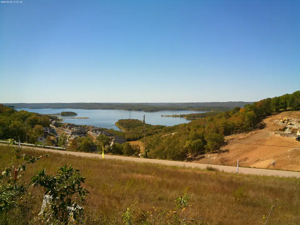 Rolling Ozark hills and Table Rock Lake under a summer sky near Branson, Missouri