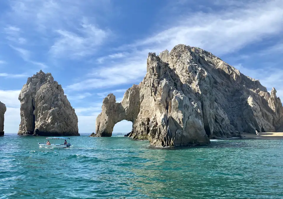 El Arco rock arch formation rising from turquoise water at Lands End, Cabo San Lucas