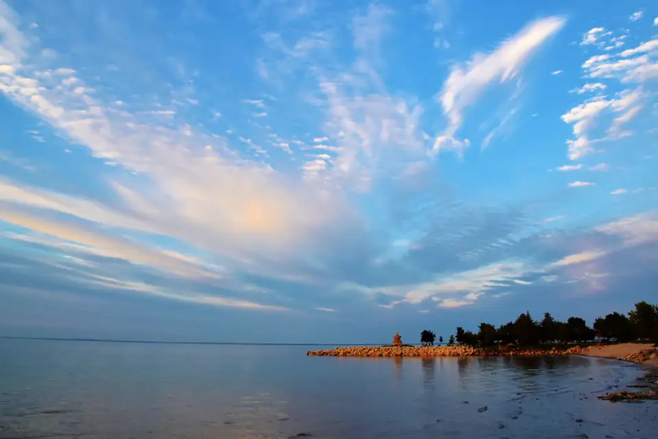 Sunset over the calm water of Georgian Bay near Collingwood, Ontario