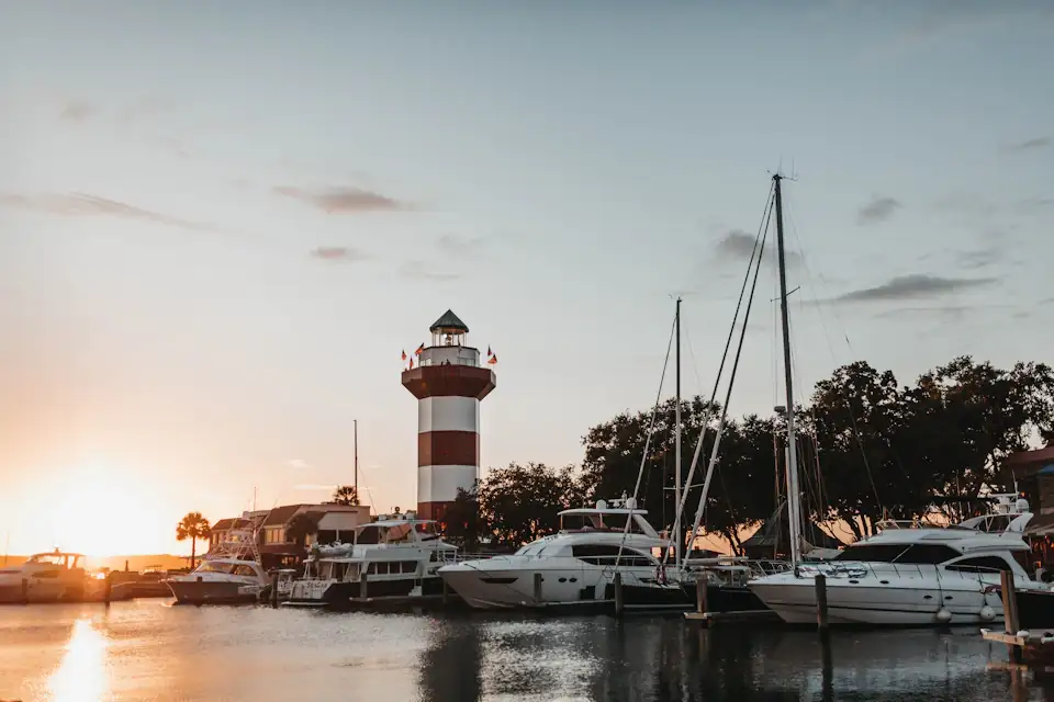 Harbour Town lighthouse and marina at sunset on Hilton Head Island, South Carolina